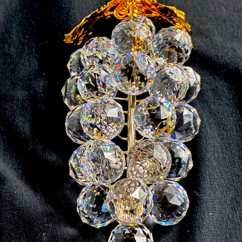 Rare Swarovski collectible vintage grapes with gold leaf.